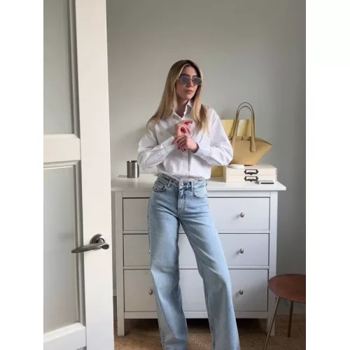 Джинсы широкие голубые от бренда ClassyBrand